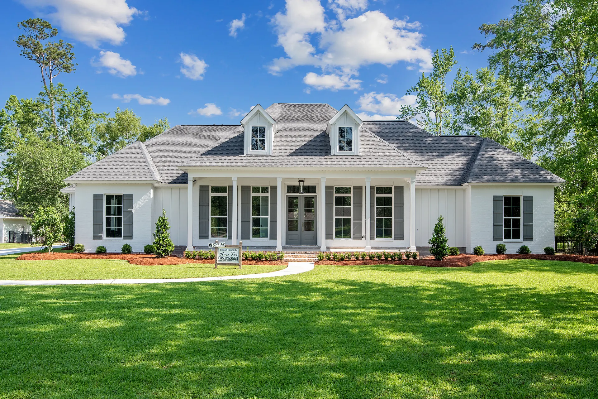 Luxury custom home exterior in St. Tammany Parish by RLH Construction